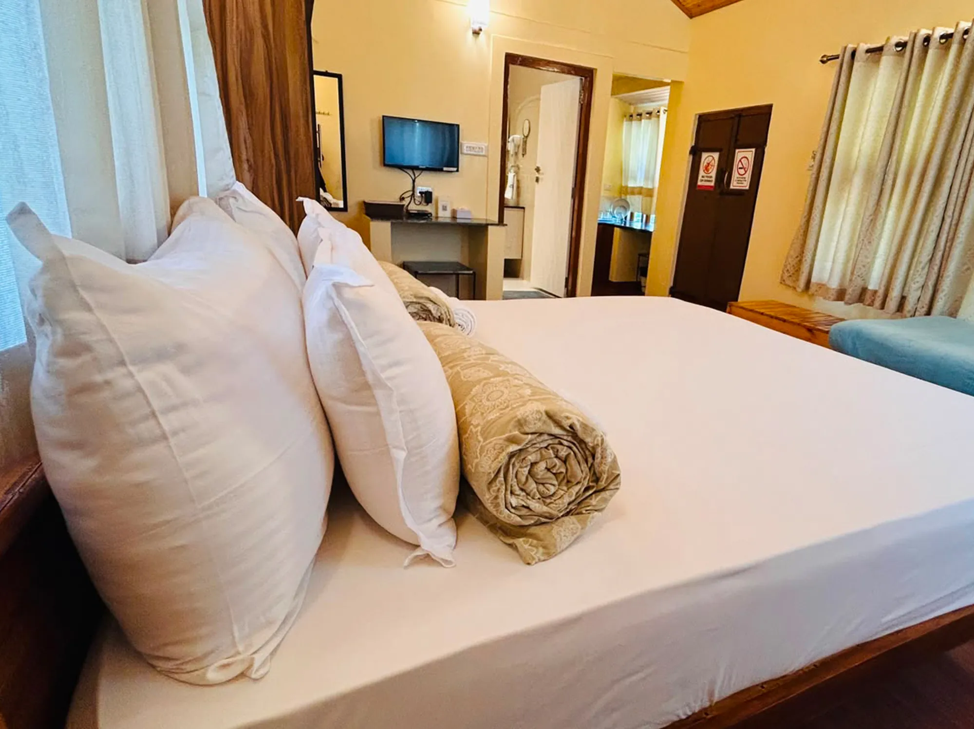 Mountain View Room interior with misty dawn Nilgiri scenery outside